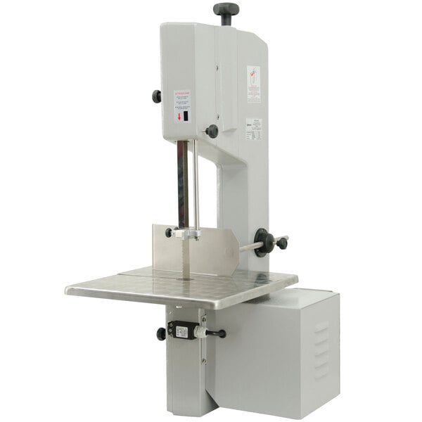 A white Omcan tabletop vertical band saw with a blade.