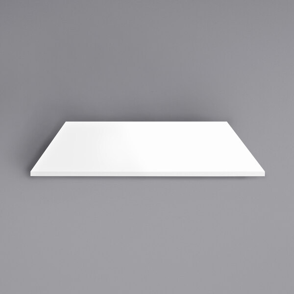 An Art Marble Furniture Winter White Quartz Tabletop on a gray surface.