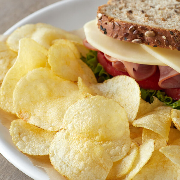 A sandwich and Martin's Sea Salted Potato Chips on a plate.