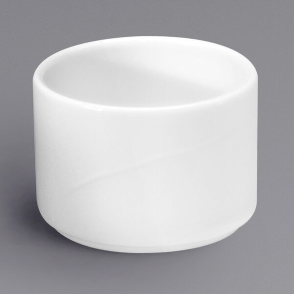 A close-up of a white Oneida Eclipse bone china bouillon cup.