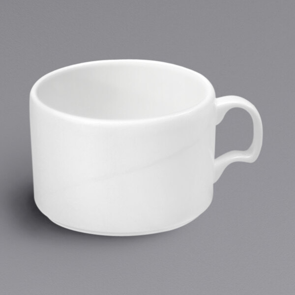 A white Oneida bone china cup with an embossed handle.