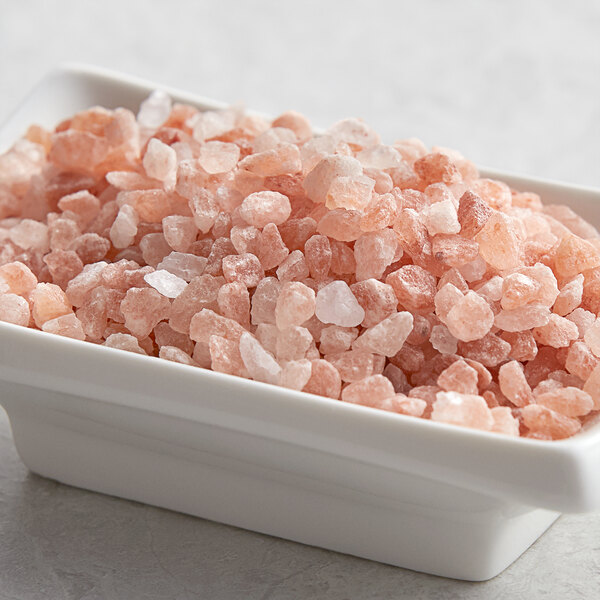 A bowl of Regal Extra Coarse Grain Pink Himalayan Salt.
