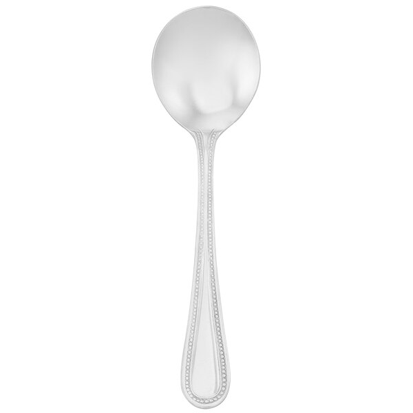 A Walco stainless steel bouillon spoon with a beaded design on the handle.