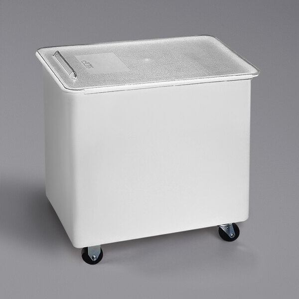 A white Carlisle ingredient storage bin with wheels and a sliding lid.