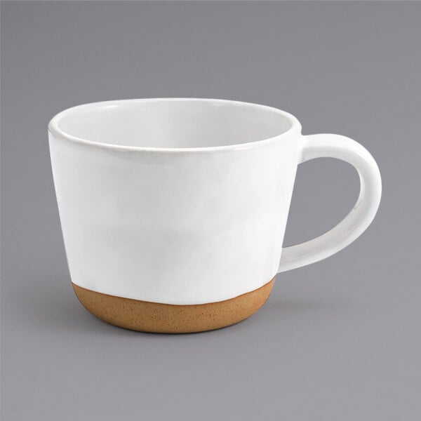 A white Front of the House Artefact mug with a white handle.