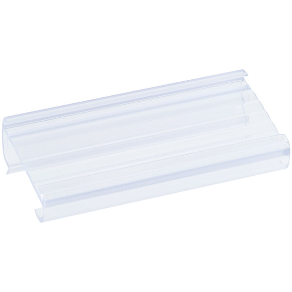 A close-up of a clear plastic Metro label holder strip.