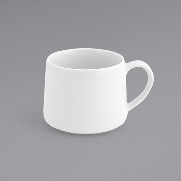 A white Front of the House Kiln porcelain cup with a handle.
