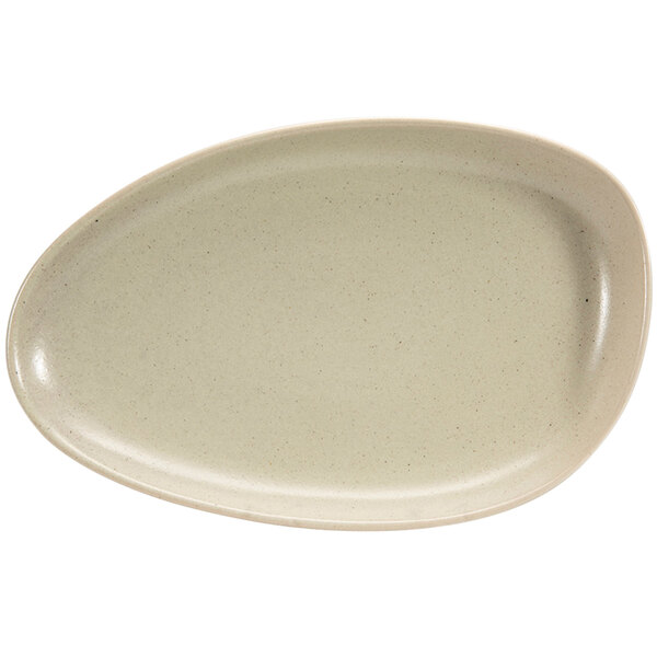 A white porcelain oval plate with a mushroom shaped surface.