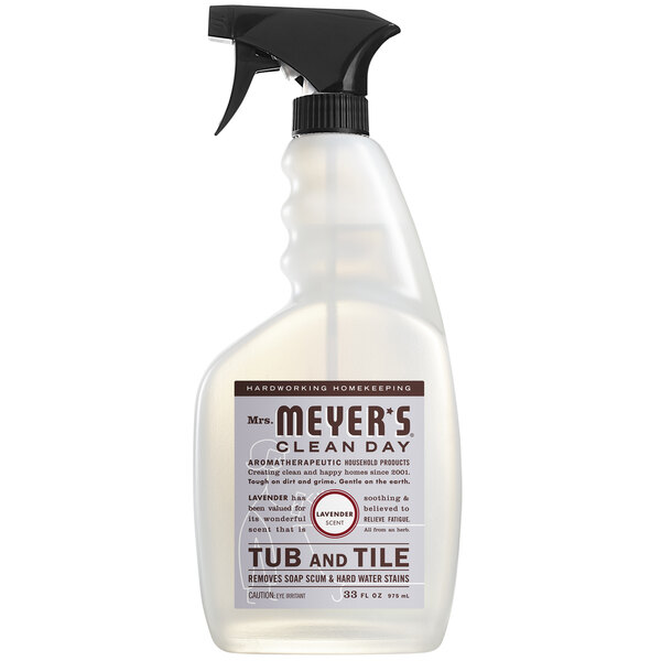 A bottle of Mrs. Meyer's Lavender Tub and Tile Cleaner with a black sprayer.