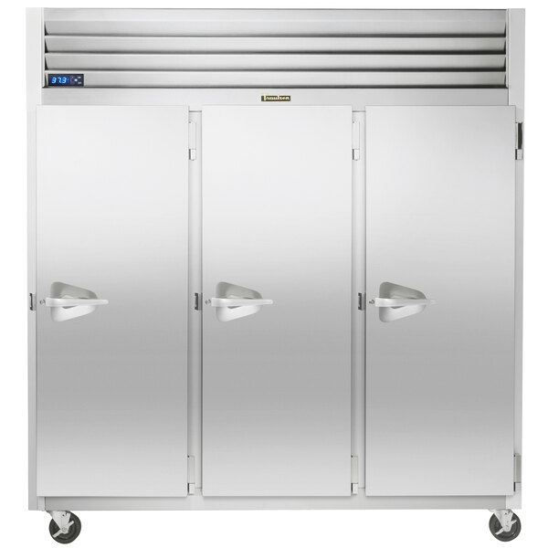 The right hinged door of a Traulsen G Series reach-in freezer with a white door handle.