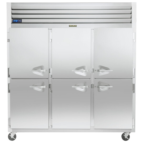 A Traulsen G Series white reach-in freezer with four doors.