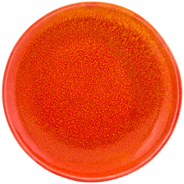 A white porcelain plate with a blood orange rim.