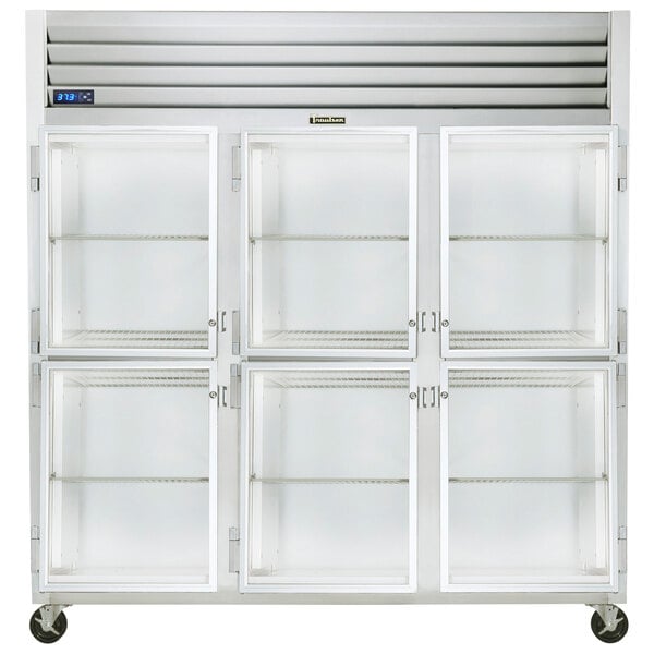 A white Traulsen G Series reach-in refrigerator with glass half doors.