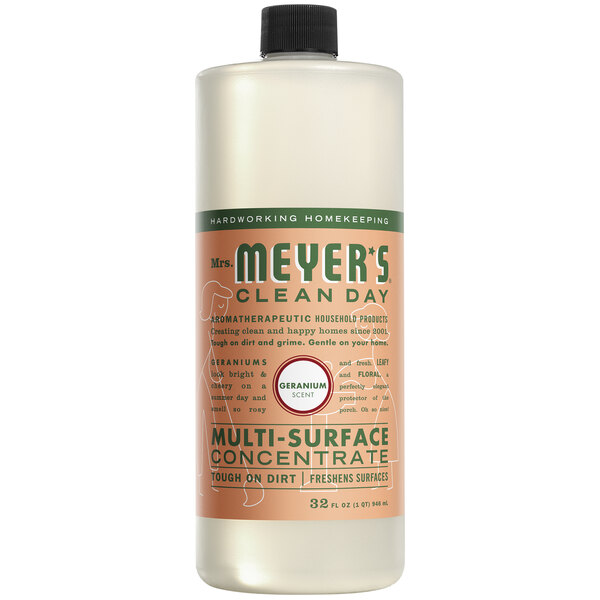A bottle of Mrs. Meyer's Geranium All Purpose Multi-Surface Cleaner on a counter.