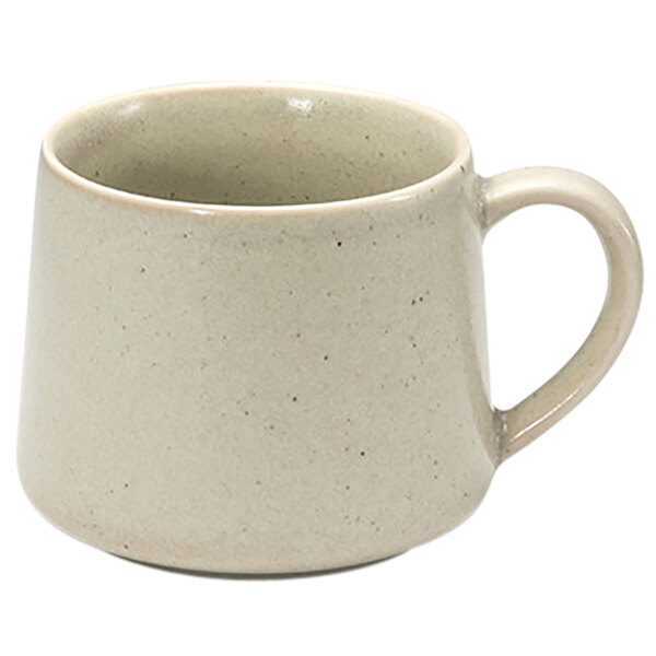 A white porcelain mug with a handle.