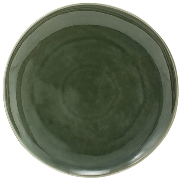 A green plate with a circular pattern on the surface.