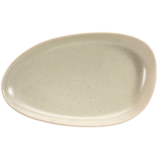 A white oval porcelain plate with a speckled edge.