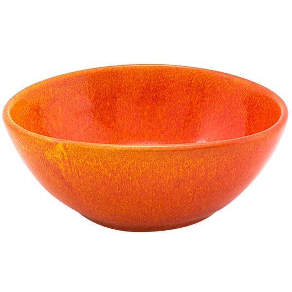 A Front of the House Kiln blood orange porcelain bowl with a white background.