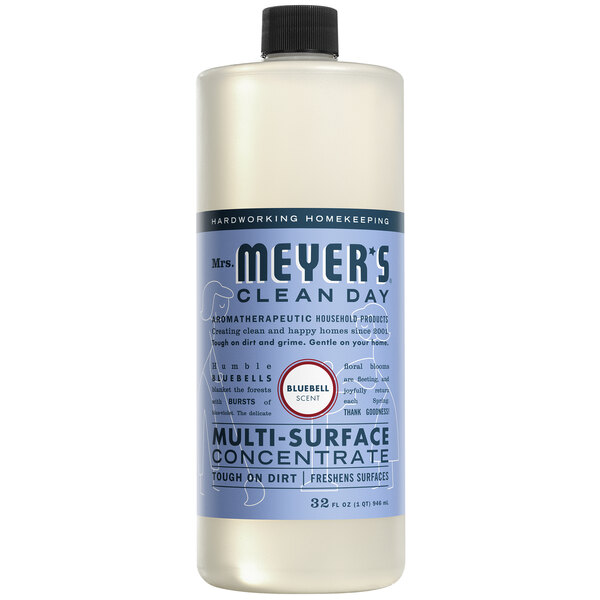 A white Mrs. Meyer's Clean Day Bluebell Multi-Surface Cleaner concentrate bottle with a blue label on a counter.