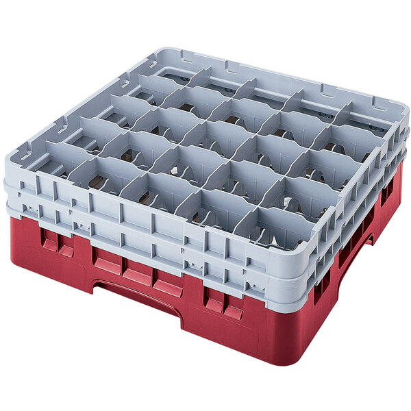 A red plastic Cambro glass rack with dividers and extenders.