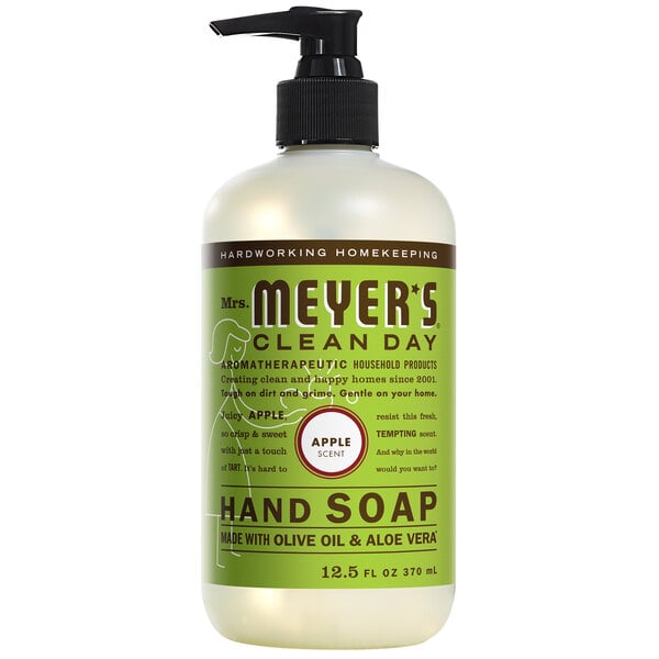 A case of six Mrs. Meyer's Clean Day apple scented hand soap bottles with pumps on a counter.