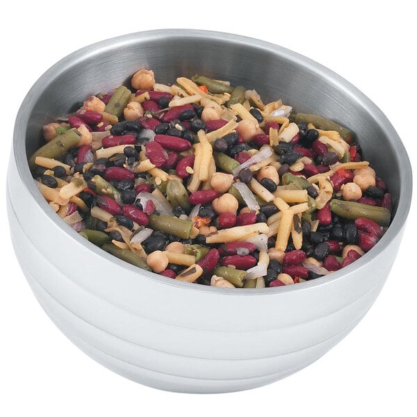 A Vollrath double wall metal serving bowl filled with beans.