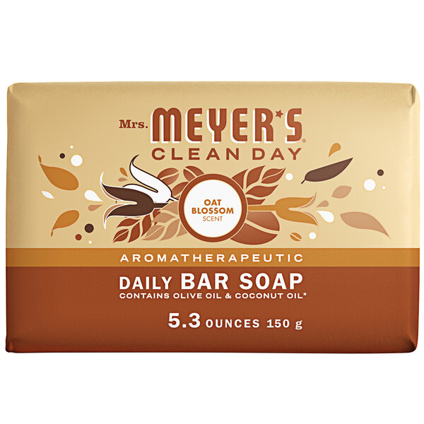 A Mrs. Meyer's Oat Blossom bar soap with text and images on the wrapper.