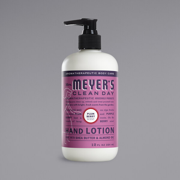 A white Mrs. Meyer's Clean Day hand lotion bottle with a purple label on a counter.