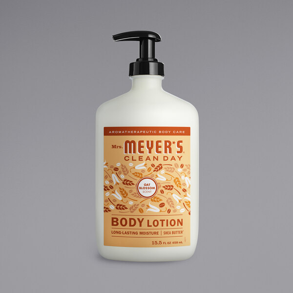 A white Mrs. Meyer's Clean Day body lotion bottle with an orange label and a black pump.