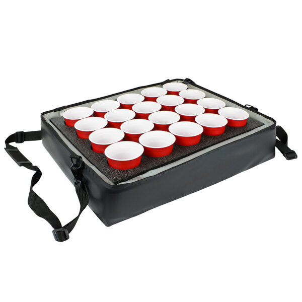 A black Sterno insulated drink holder with red cups in it.