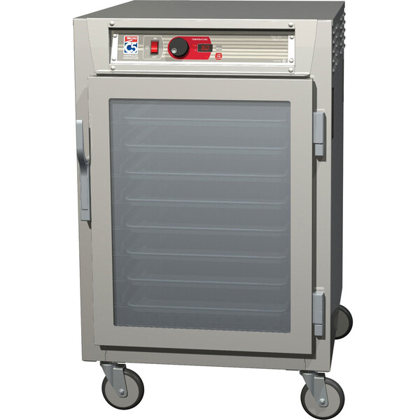 A white Metro C5 heated holding cabinet with clear glass doors.