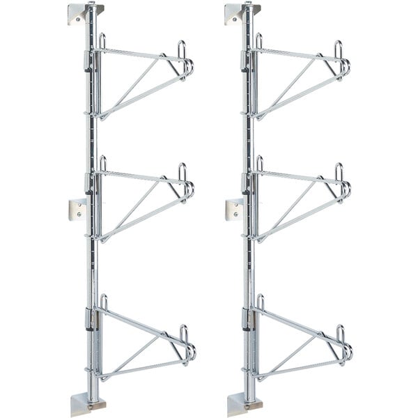 A pair of Metro chrome wall mount end units with three shelves on each side.