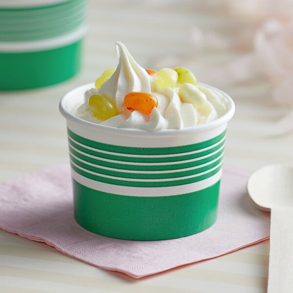A green Choice paper cup filled with frozen yogurt.