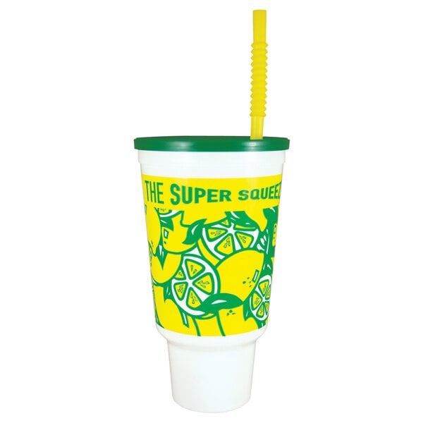 A yellow and green 44 oz. lemonade cup with a green lid and straw.