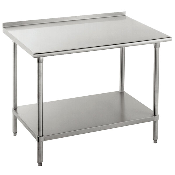 An Advance Tabco stainless steel work table with a galvanized undershelf on a counter.