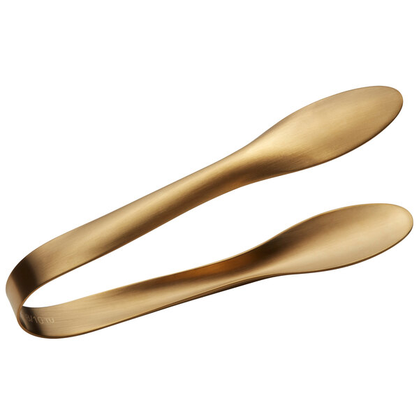 A pair of Bon Chef stainless steel tongs with gold matte handles.
