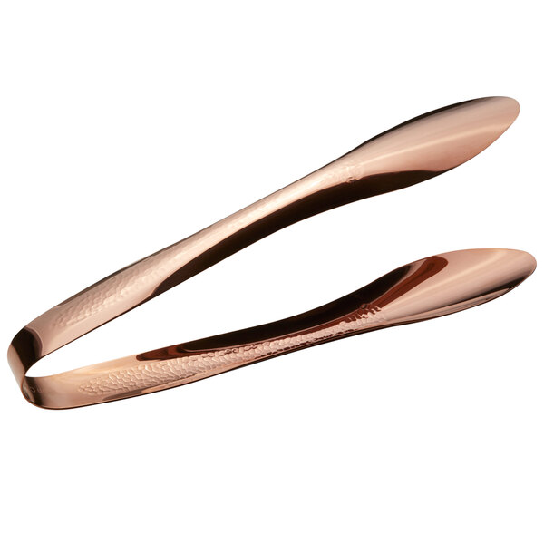 A pair of Bon Chef rose gold stainless steel tongs with a hollow handle.