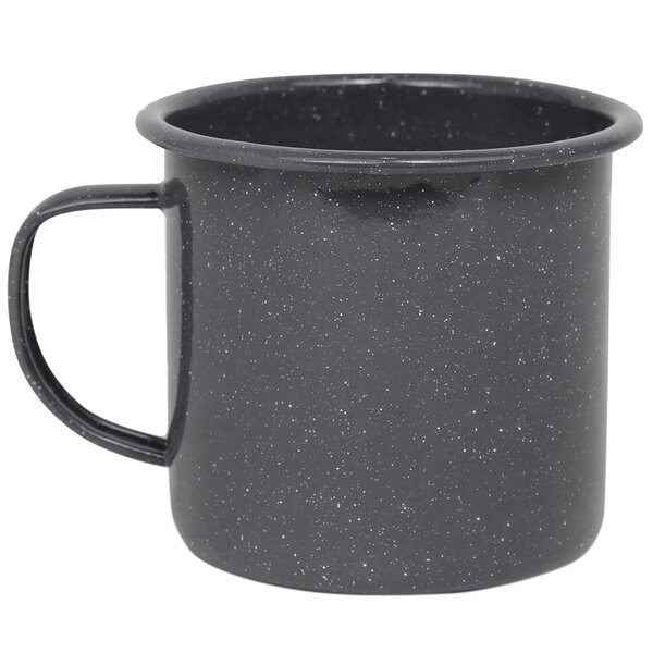A grey Crow Canyon Home enamelware mug with speckled design and a handle.