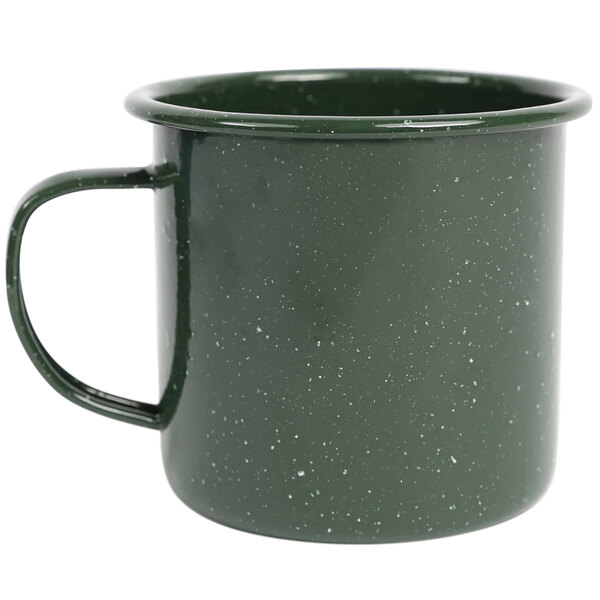 A Crow Canyon Home forest green enamelware mug with a speckled design and handle.