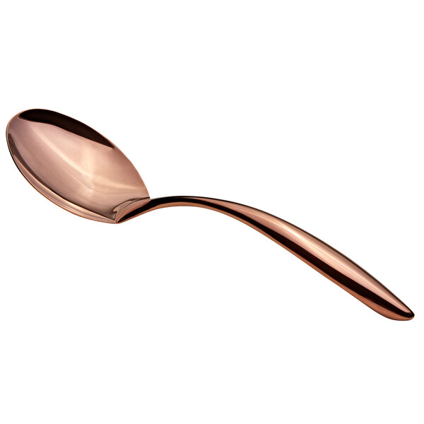 A close-up of a Bon Chef stainless steel serving spoon with a rose gold handle.