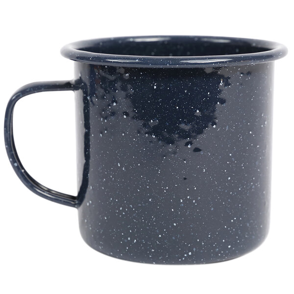 A navy blue speckled enamelware mug with a handle.