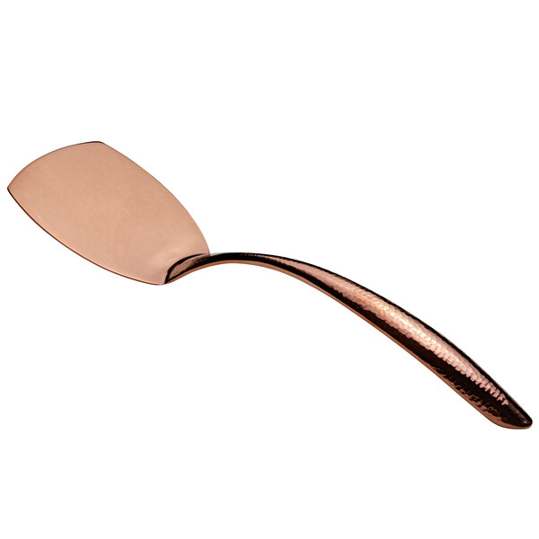 A Bon Chef rose gold stainless steel turner with a hammered handle.