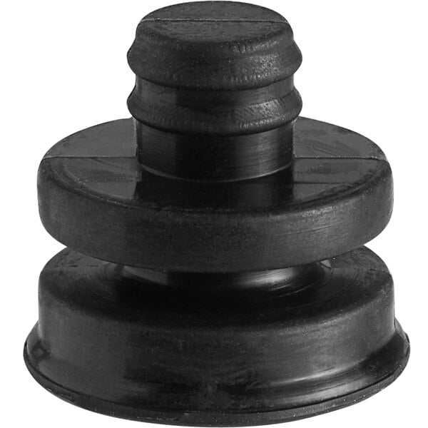 A black rubber non-skid foot with a round metal cap.