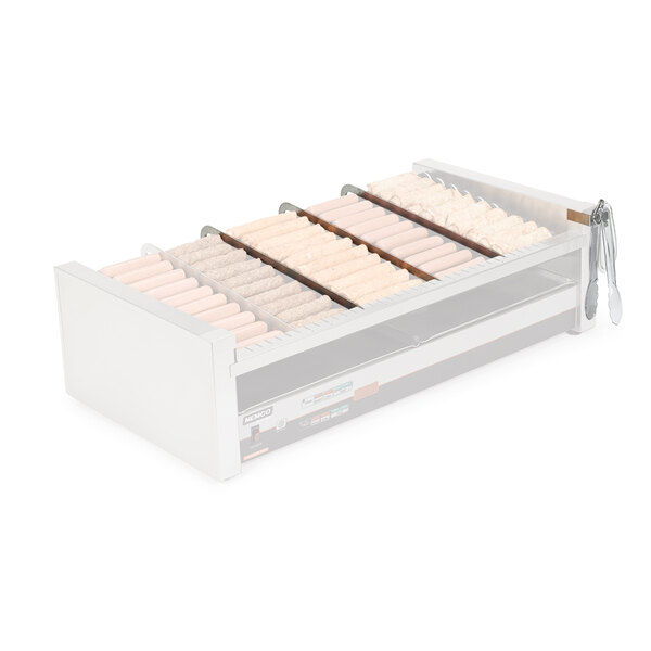A Nemco Divider Kit in a white tray with several hot dogs.
