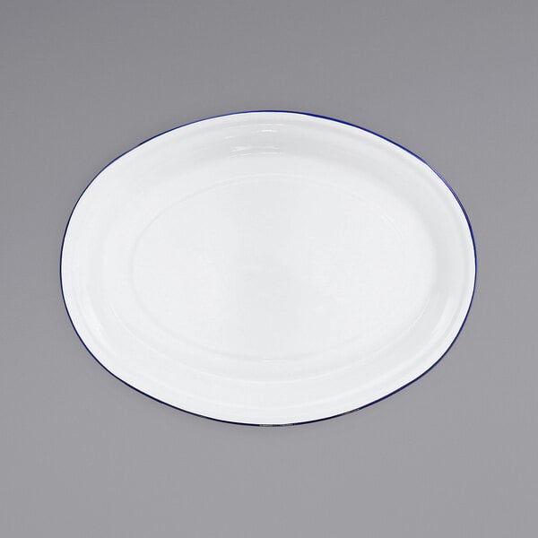 A white oval platter with a blue rim.