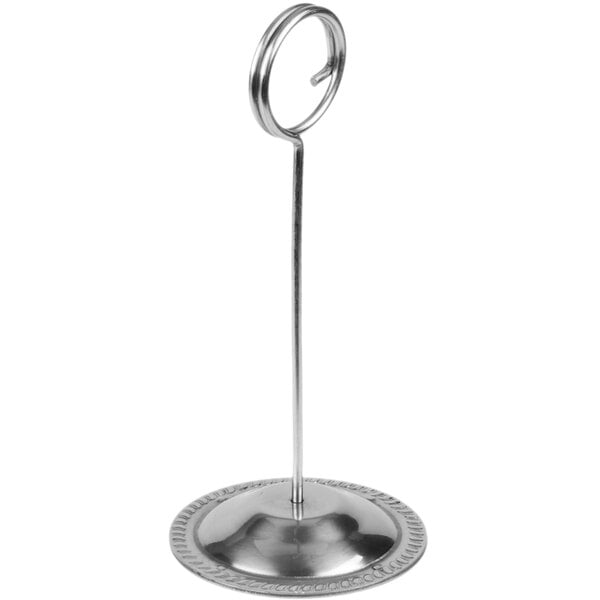 An American Metalcraft stainless steel table card holder with a circular ring.