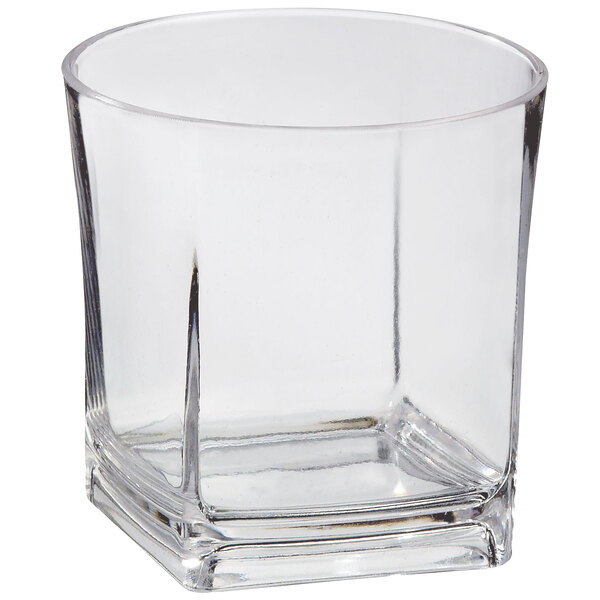 A Solia clear plastic mini whisky cup with a square bottom.