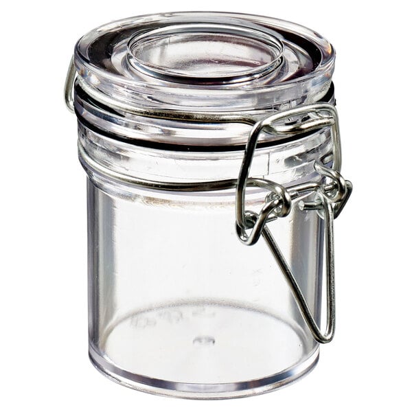 A Solia clear plastic jar with a metal lid.