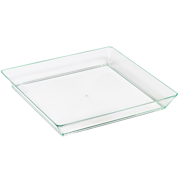 A clear square Solia green plastic plate.