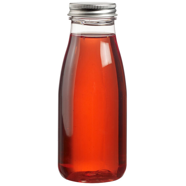 A Solia clear plastic bottle filled with red liquid and a silver cap.